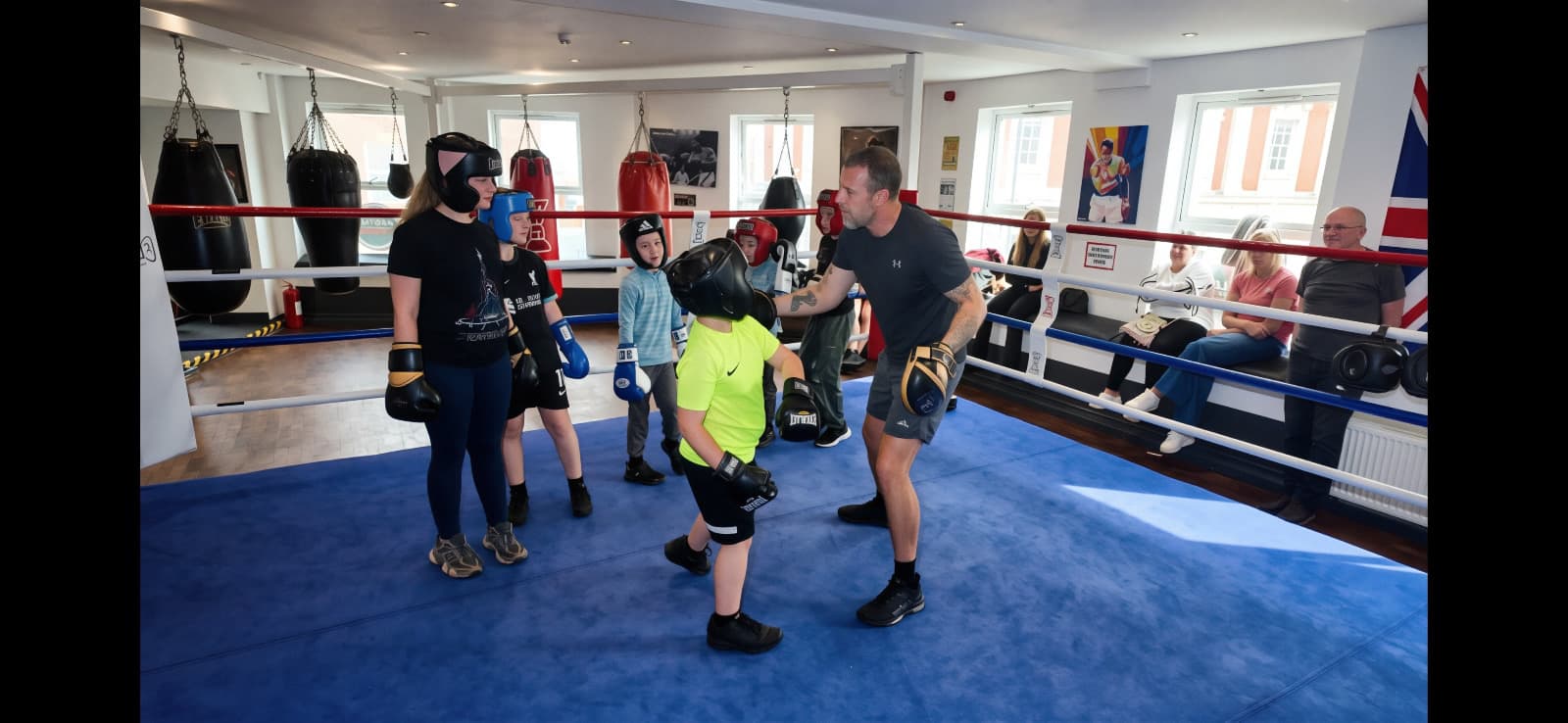 Young people taking part in a supported boxing session