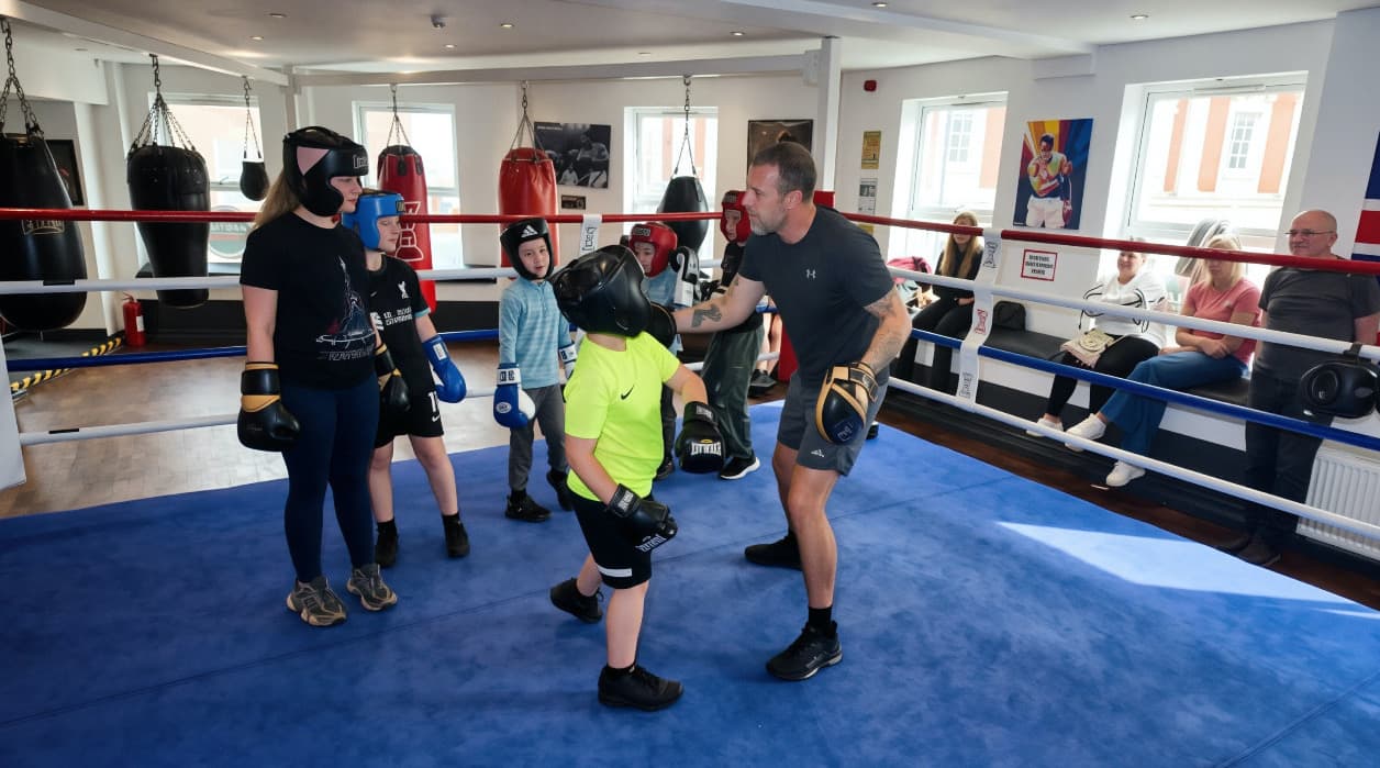 Young people taking part in a junior boxing session